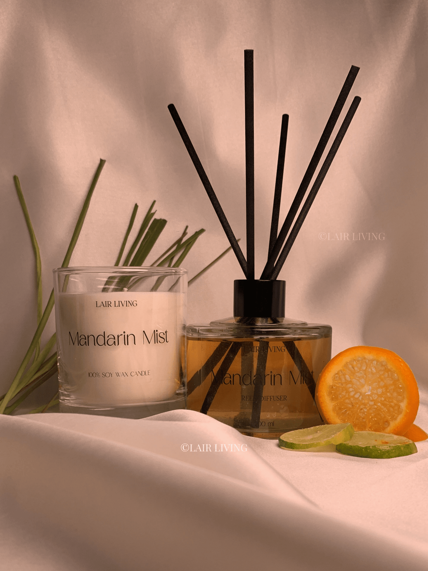 Lair Living Mandarin Mist Reed Diffuser with 8 reed sticks and soy wax candle, featuring vibrant citrus scents for a refreshing home fragrance. Best in India for luxury living and gifting.