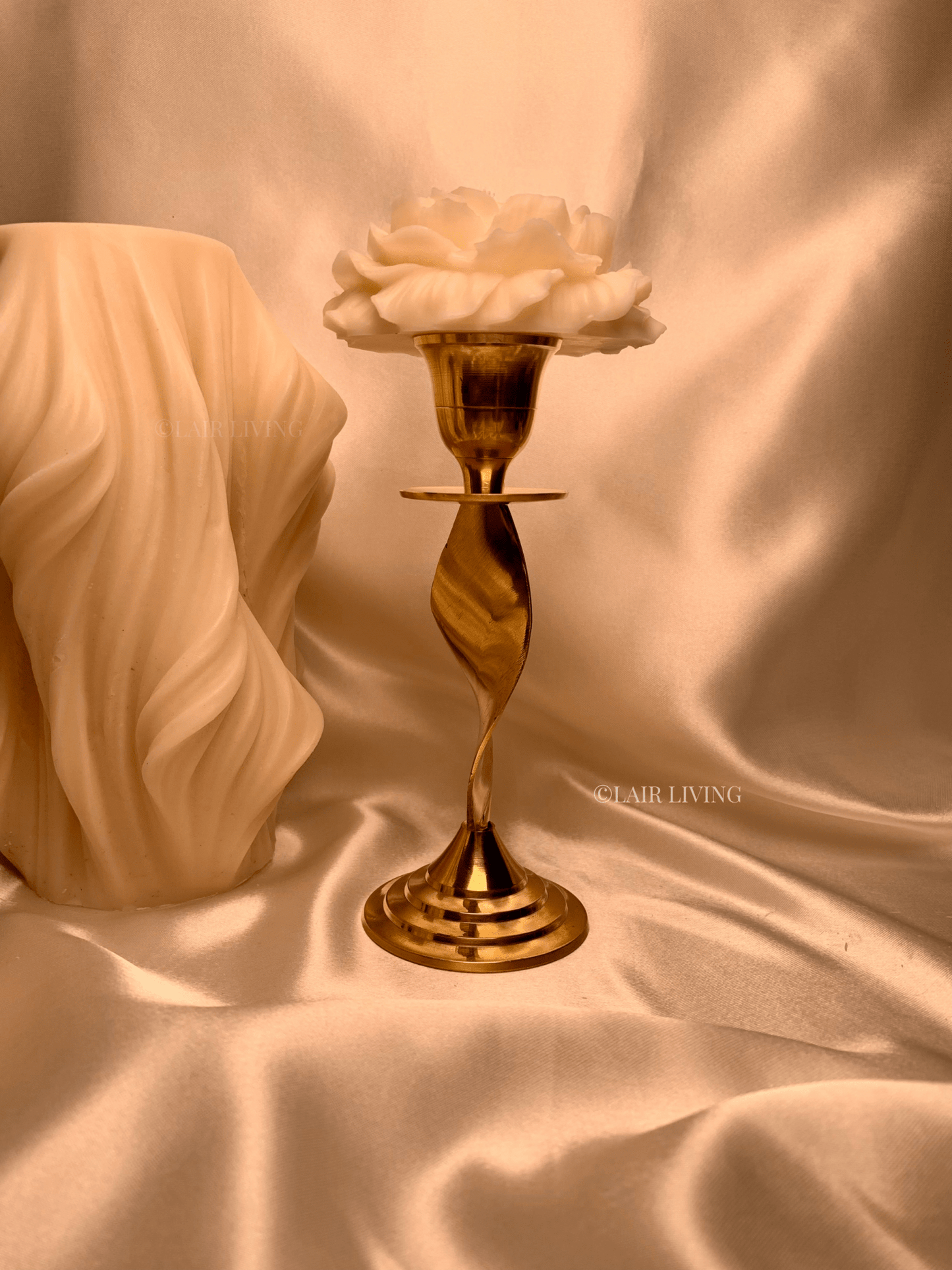 Elegant pure brass tapered candle stand by Lair Living, perfect for luxury home decor and special occasions. Adds a warm, sophisticated ambiance to any room. Best in India for luxury gifting and decor.