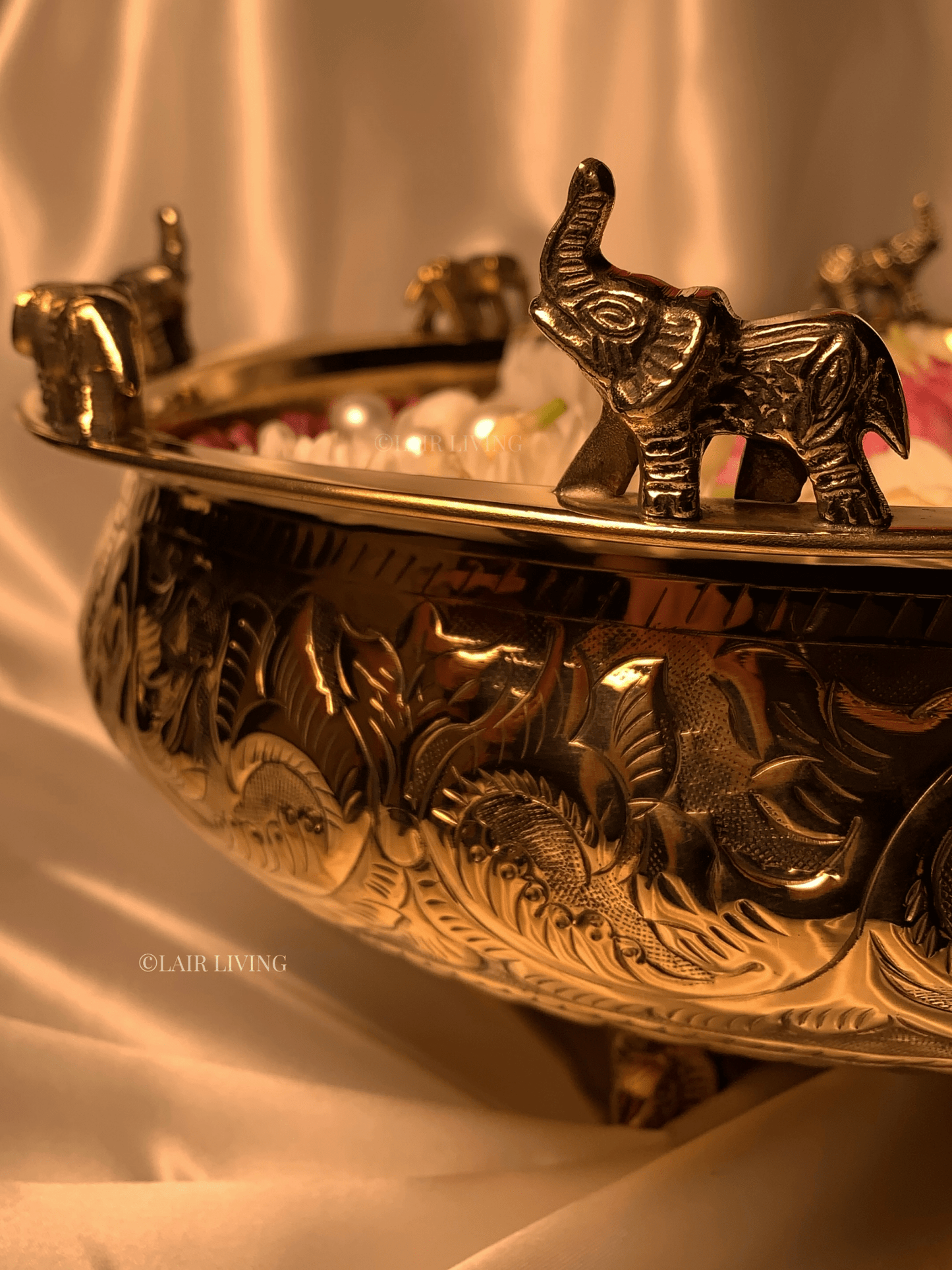 Lair Living's pure brass urli with intricate elephant design, ideal for festivals and home decor. A luxury decorative piece that enhances your space with traditional elegance. Best in India for premium home decor and gifting.