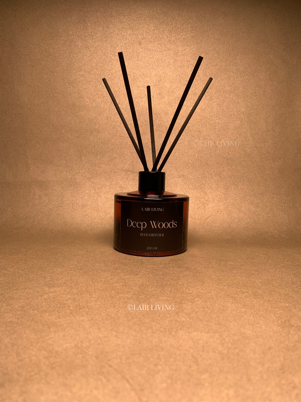 Reed diffuser styled on an entryway console table