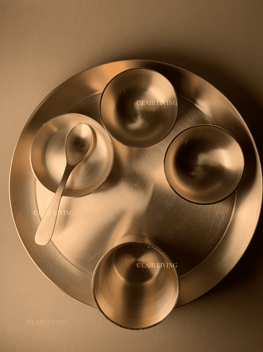 Mixing stoneware ceramic and metal tableware - Lair Living dining guide India