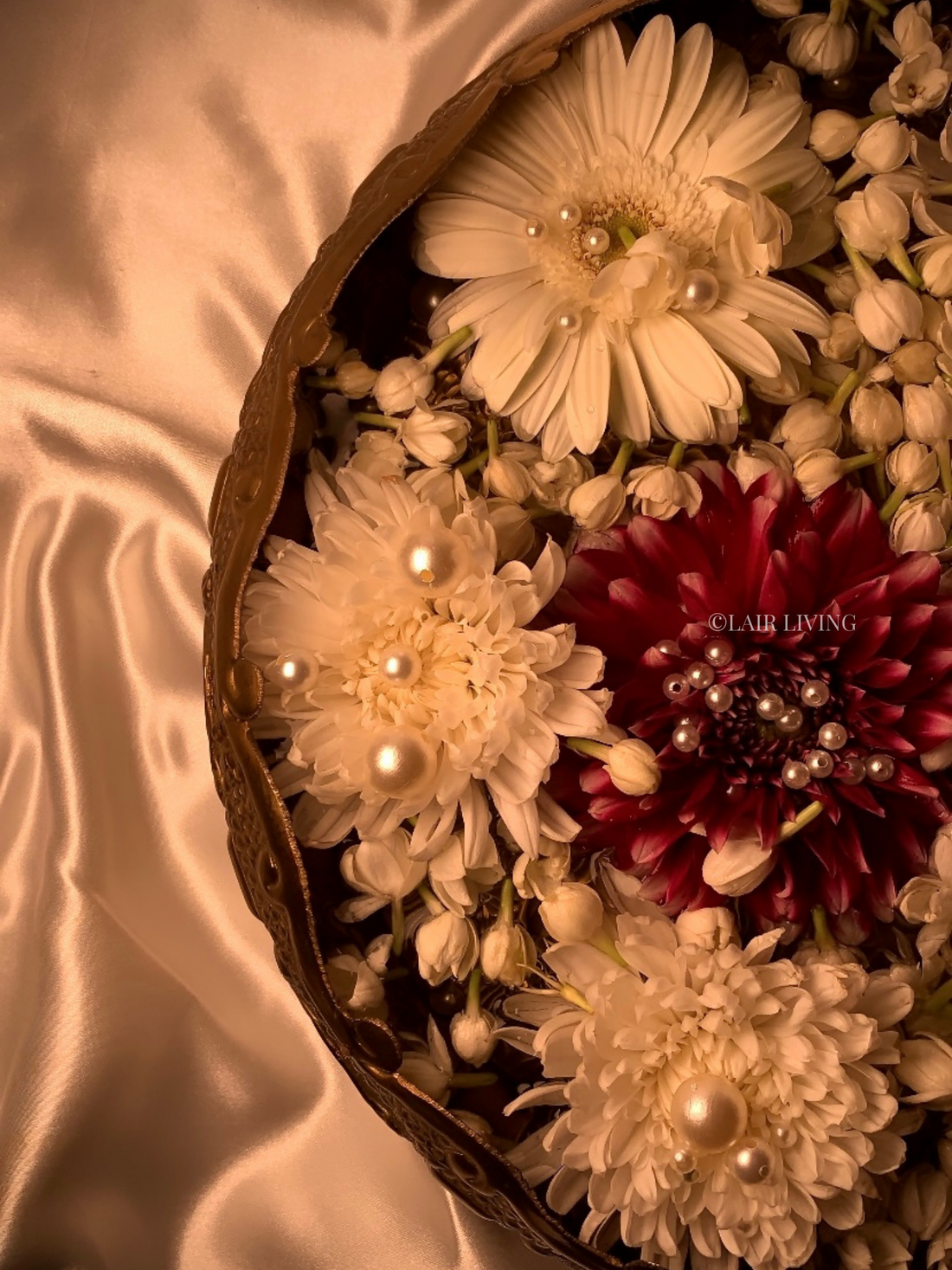Brass bowl suitable for displaying potpourri in an Indian home