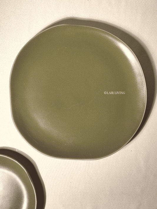Verdant full plate in matte olive-green handmade ceramic stoneware with an organic waving rim — Lair Living