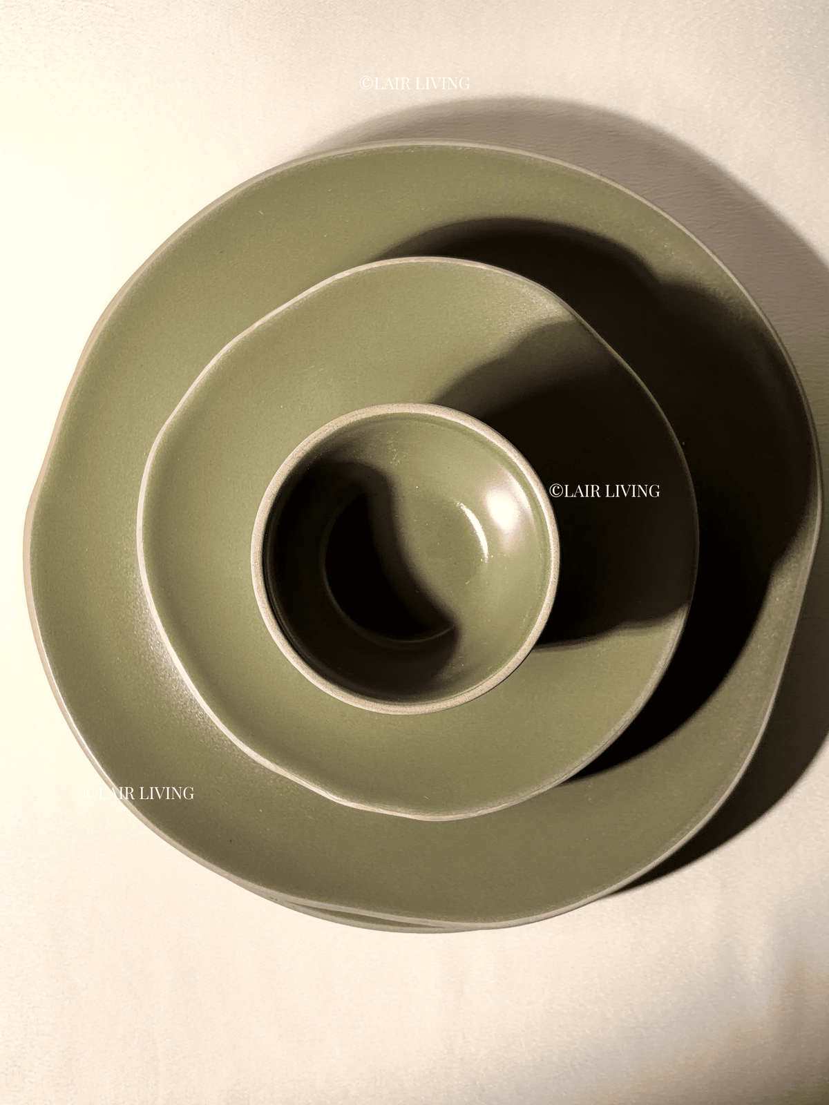 Verdant full plate, quarter plate and katori nested together in matte olive handmade ceramic — Lair Living