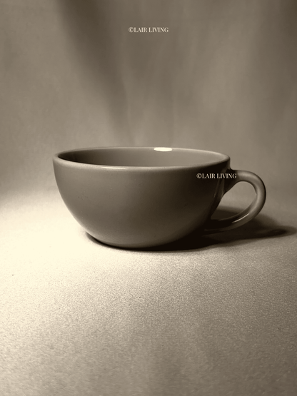 Ashen cappuccino cup in warm greige handmade ceramic stoneware, wide shallow bowl shape with loop handle — Lair Living