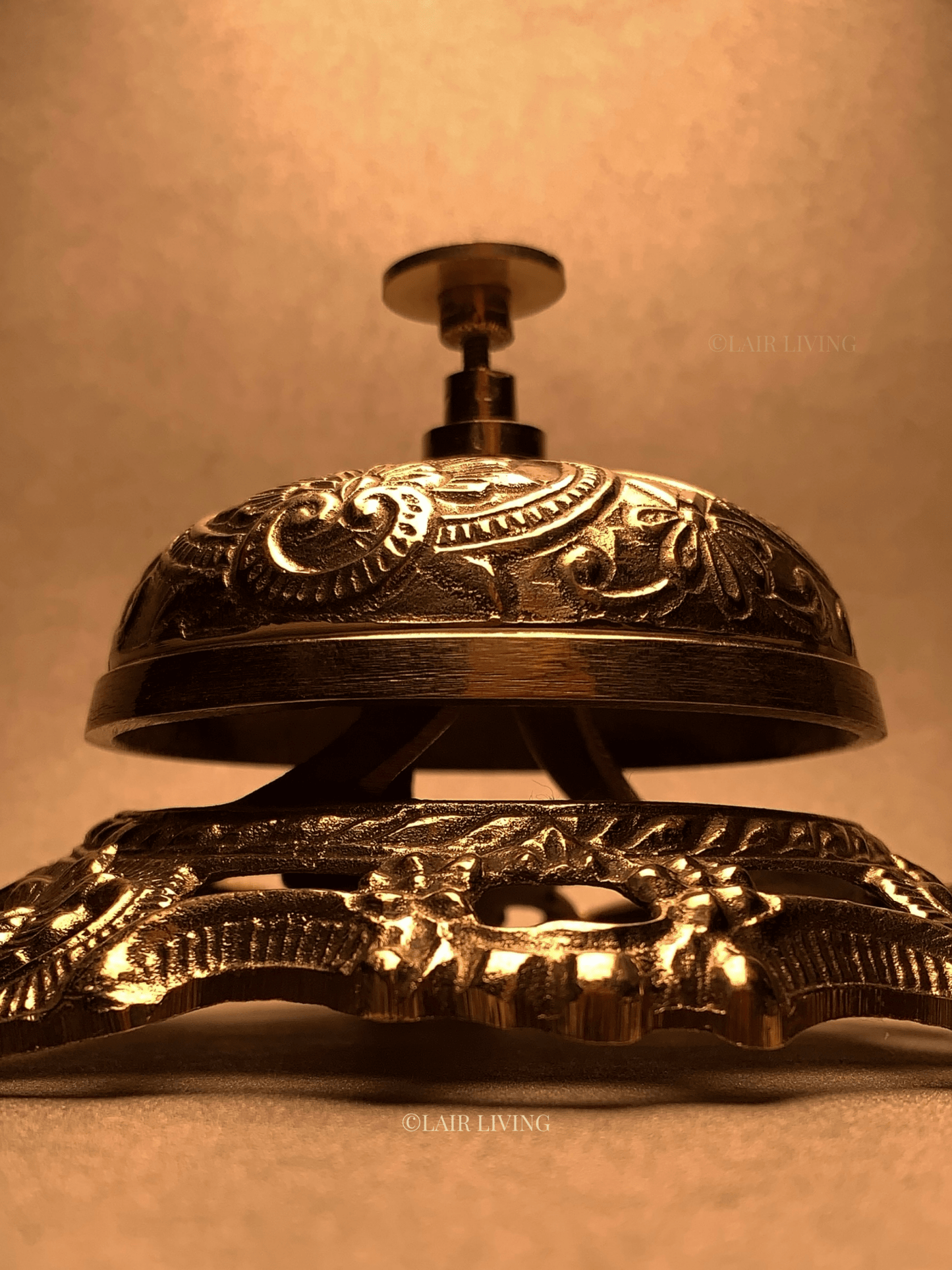 Elegant pure brass table bell by Lair Living, ideal for premium office accessories and high-end decor. Combines functionality with traditional craftsmanship. Best in India for luxury decor and gifting.