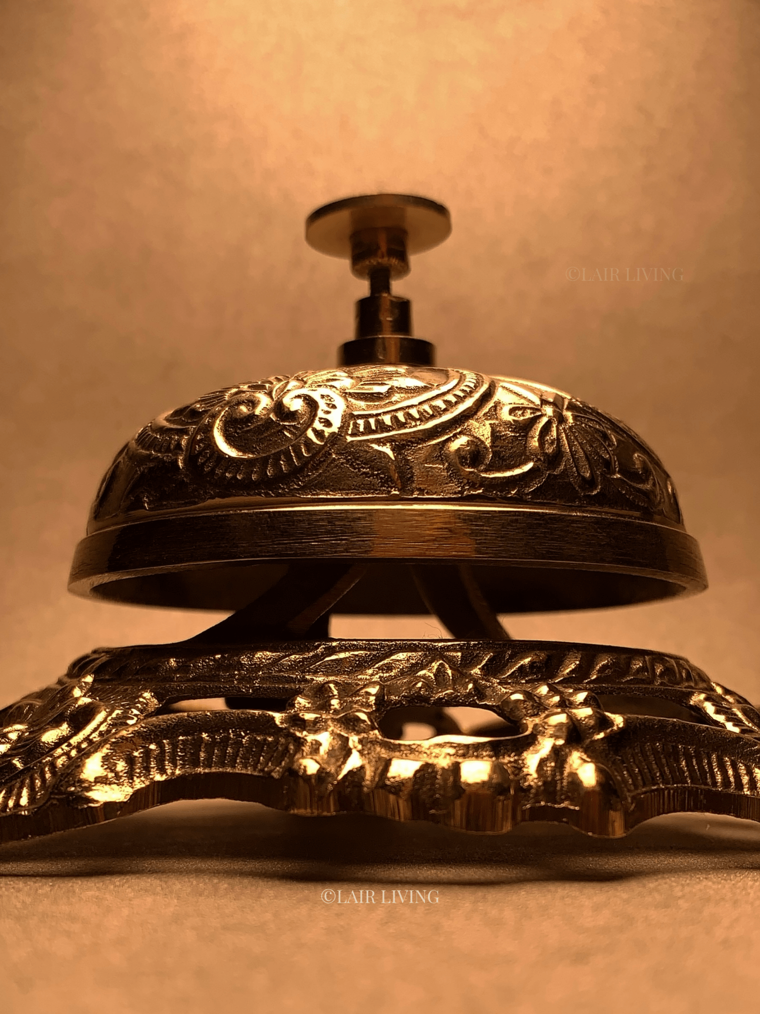Elegant pure brass table bell by Lair Living, ideal for premium office accessories and high-end decor. Combines functionality with traditional craftsmanship. Best in India for luxury decor and gifting.