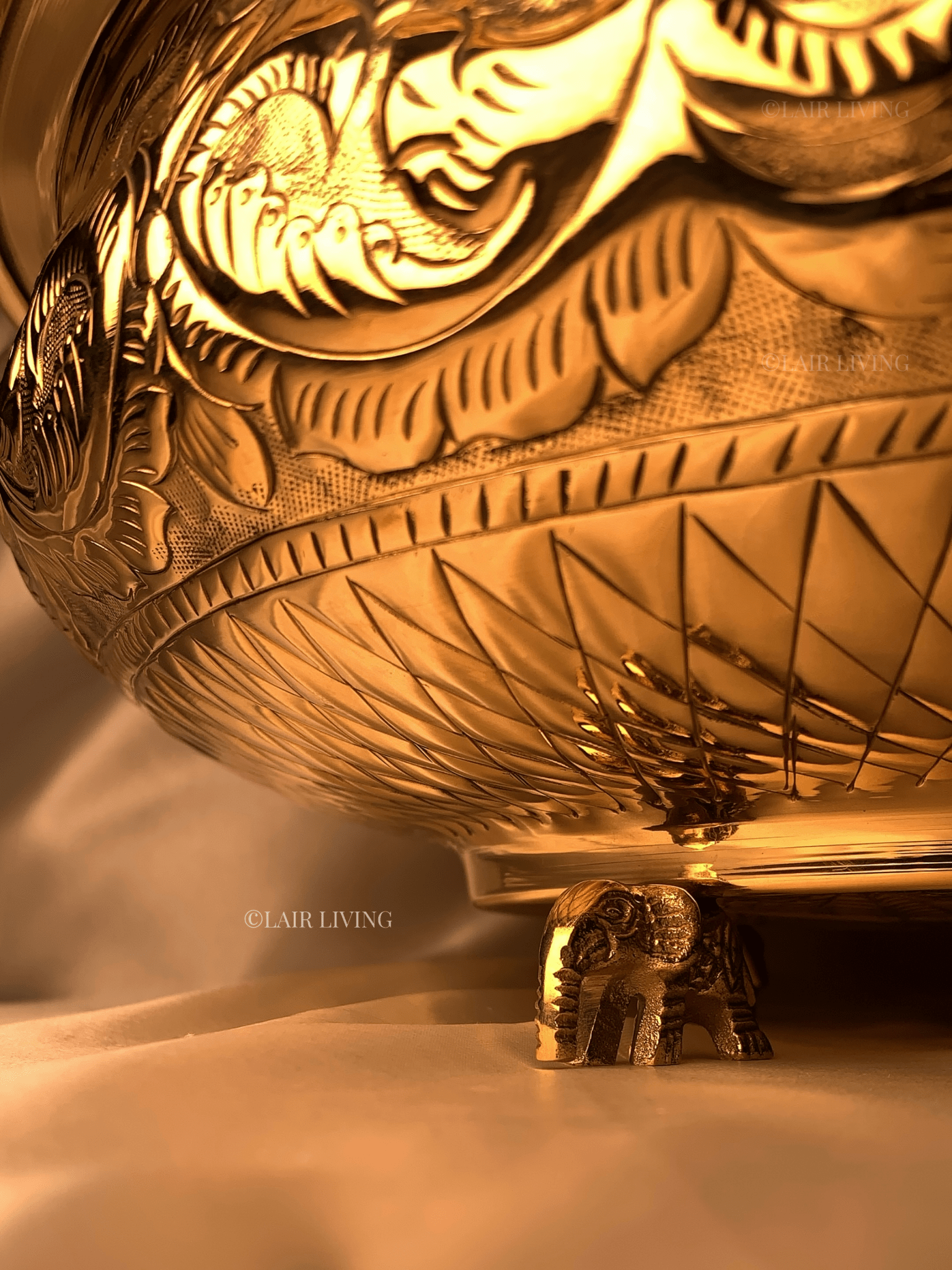 Lair Living's pure brass urli with intricate elephant design, ideal for festivals and home decor. A luxury decorative piece that enhances your space with traditional elegance. Best in India for premium home decor and gifting.