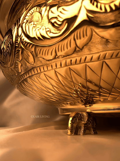 Lair Living's pure brass urli with intricate elephant design, ideal for festivals and home decor. A luxury decorative piece that enhances your space with traditional elegance. Best in India for premium home decor and gifting.