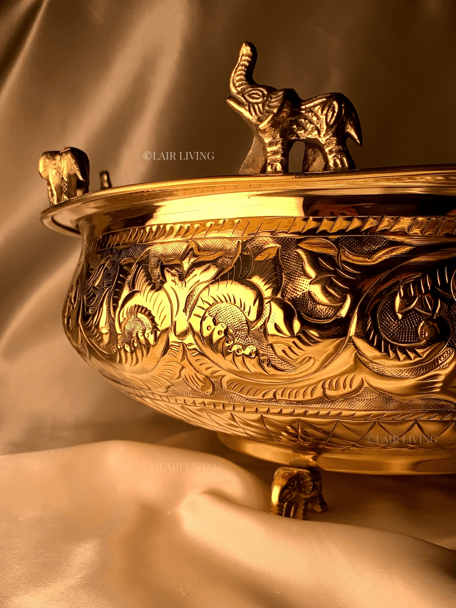 Lair Living's pure brass urli with intricate elephant design, ideal for festivals and home decor. A luxury decorative piece that enhances your space with traditional elegance. Best in India for premium home decor and gifting.